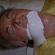 Man spewing white substance from his mouth in trailer for The Stuff